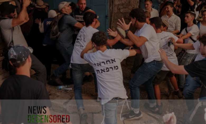 Thousands of Israelis march through Jerusalem, with some attacking Palestinians