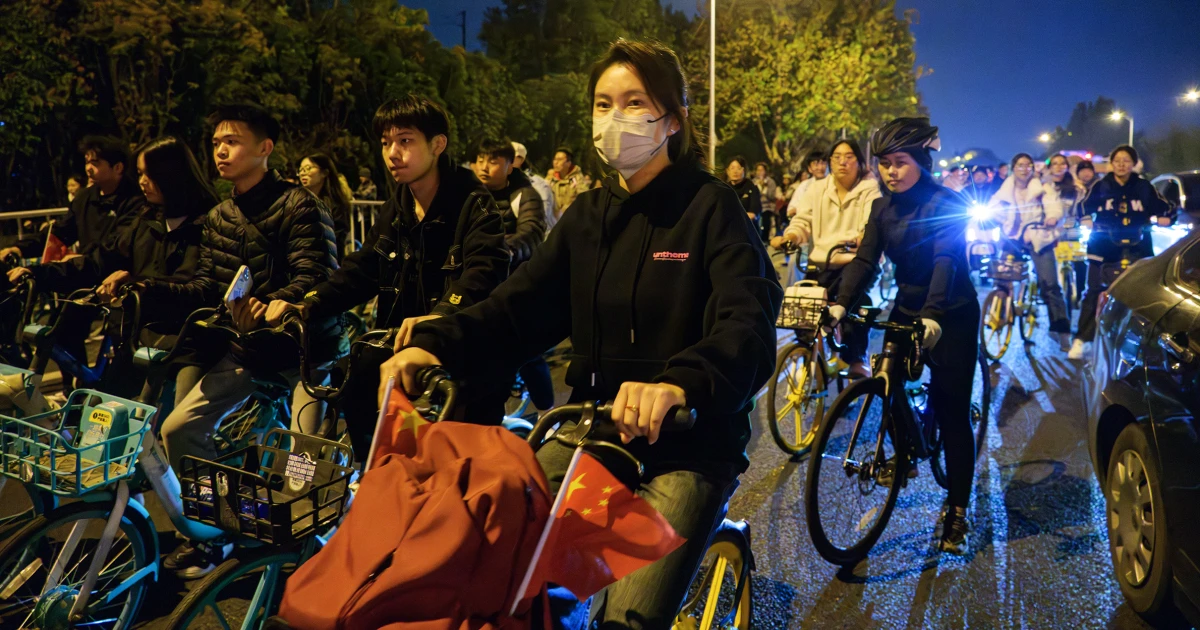 Cyclists Swarm China’s Roads in Nighttime Quest for Dumplings.